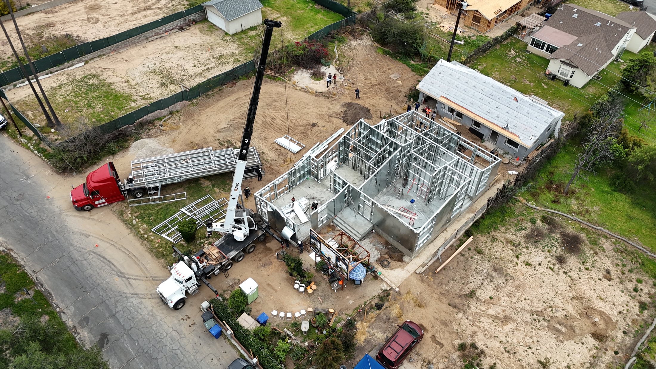 Aerial of the Altadena rebuild during delivery and erection